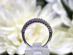 .20ct bezel set natural round brilliant diamond ring in 10K white gold side view.