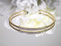 .50ct total weight natural diamond flex bracelet in 10K yellow gold.