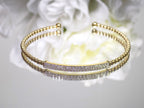 .50ct total weight natural diamond flex bracelet in 10K yellow gold.