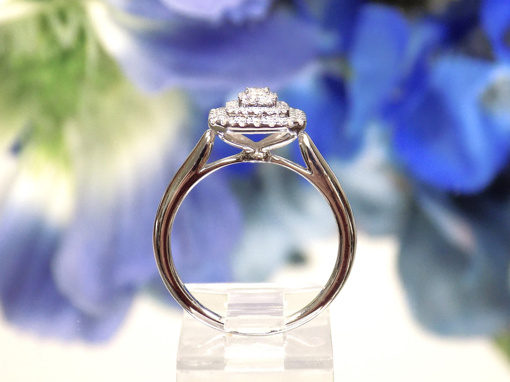 .50ct total weight natural diamond cluster ring in 10K white gold. Side view.