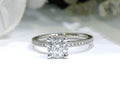 This is a straight line style 1.39ct total weight natural round brilliant diamond ring in white gold shown with a white background.