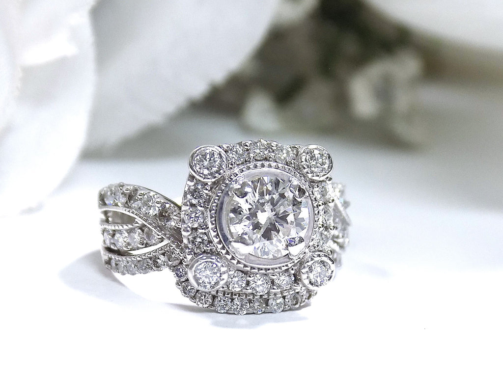 The is a 1.95ct total weight natural 2-piece natural round diamond wedding set with engagement ring and matching band already tacked together from our estate collection in white gold with white background. 