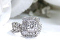 The is a 1.95ct total weight natural 2-piece natural round diamond wedding set with engagement ring and matching band already tacked together from our estate collection in white gold with white background. 