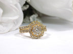 2-Piece yellow gold and diamond wedding set with matching band with white background.