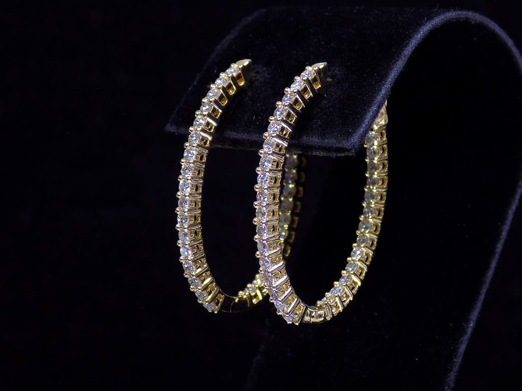 2.00ct total weight natural diamond in and out style oval hoops in 14K yellow gold. Side view.