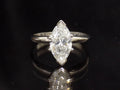 This is a 2.03ct marquise shape diamond solitaire in white gold on black mirrored background.