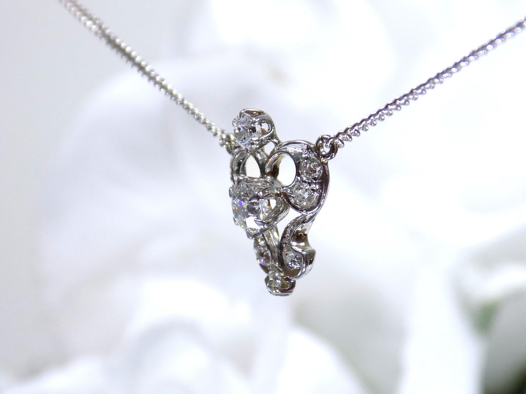 Antique .66ct total weight custom diamond necklace in 18K white gold side view. circa 1900 