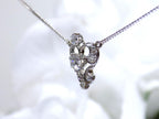 Antique .66ct total weight custom diamond necklace in 18K white gold side view. circa 1900 