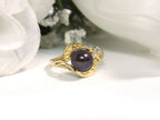 This a genuine black pearl ring in yellow gold from our estate collection fully restored to like new condition with a white gold background.