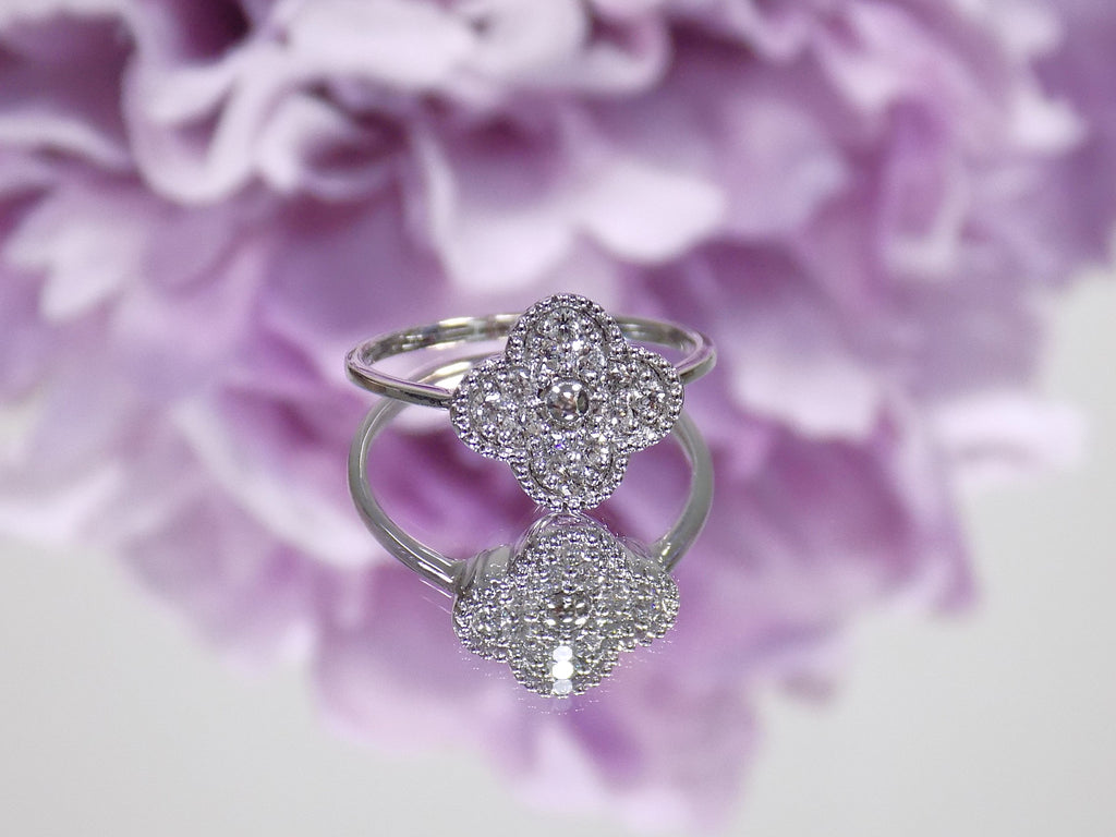 This is a Natural Diamond Van Cleef Style White Gold Ring.