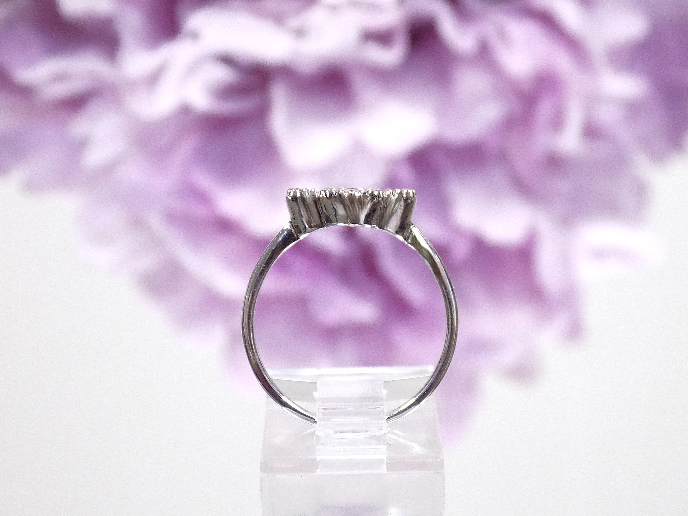 This is a Natural Diamond Van Cleef Style White Gold Ring side view.