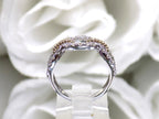 1.50ct natural diamond two tone white and yellow gold band from a side view.