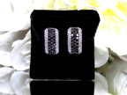 1.00ct total weight natural black and white diamond earrings in solid 14K white gold.