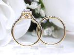 This is a side view of both an oval shape diamond engagement ring and its matching band in yellow gold with white gold prongs and a white background.