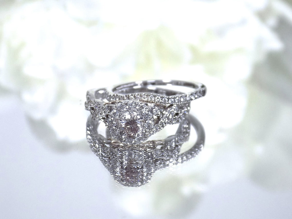 This is a women's 2-piece wedding set which includes the engagement ring and matching band weighing 1.02ct in natural diamonds in white gold with rose gold accents on a mirrored white background