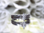 Preowned white gold ladies small marquise shape diamond ring.