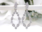 This is a pair of .50ct Natural Diamond Dangle Earrings in 14K White Gold.