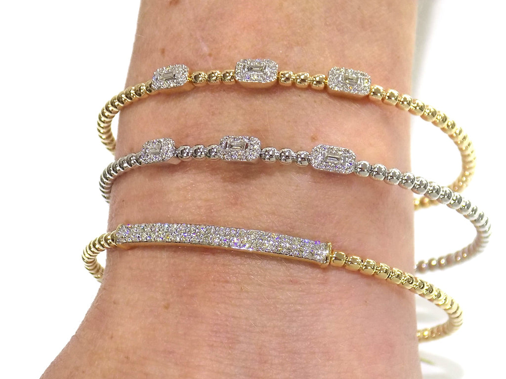 Natural diamond flex bracelets in 10K yellow or white gold.