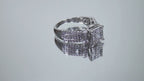 This is a video of a 1.00ct total weight natural diamond ring in white gold shown turning slowly on a mirrored background.