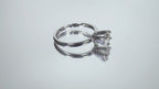 The is video of a natural .60ct round brilliant diamond solitaire engagement ring in white gold shown turning slowly on mirrored background.