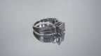 This is a video of an Estate ring with 1.00ct total weight invisible set diamond ring with natural princess cut and round diamonds in white gold.
