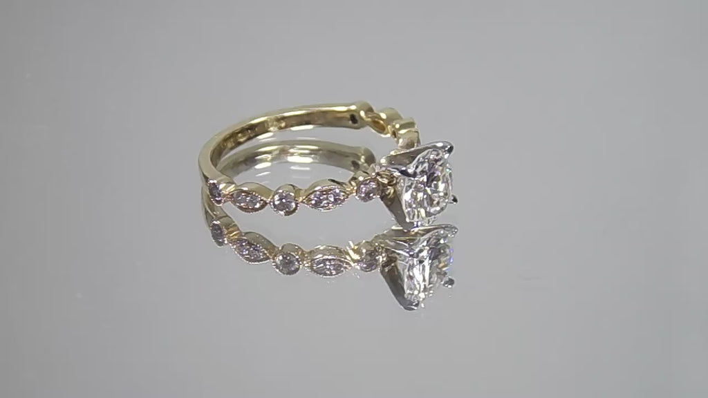 Woman's 1.32ct TW Natural Round Brilliant Diamond Engagement Ring with a 1.10ct Round Center in 14K Yellow Gold