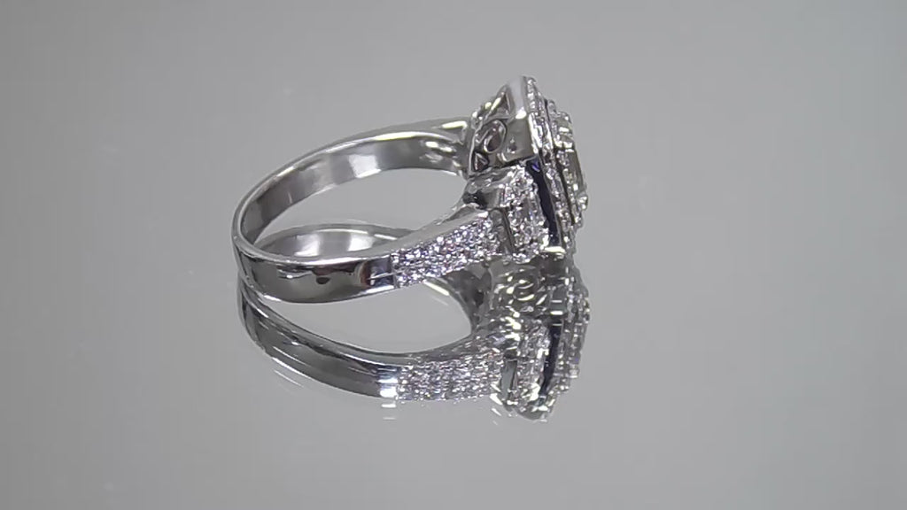 This is video of 1.56ct total weight natural emerald cut and round diamond ring in platinum shown rotating slowly on a mirrored background.