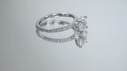 This is a video of a straight line style 1.39ct total weight natural round brilliant diamond ring in white gold shown rotating slowly on mirrored background.