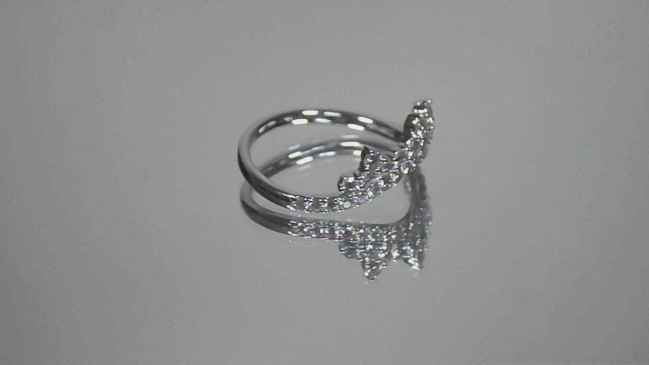 .63ct total weight natural round brilliant diamond tiara style ring in 14K white gold rotating in a video on a white background.