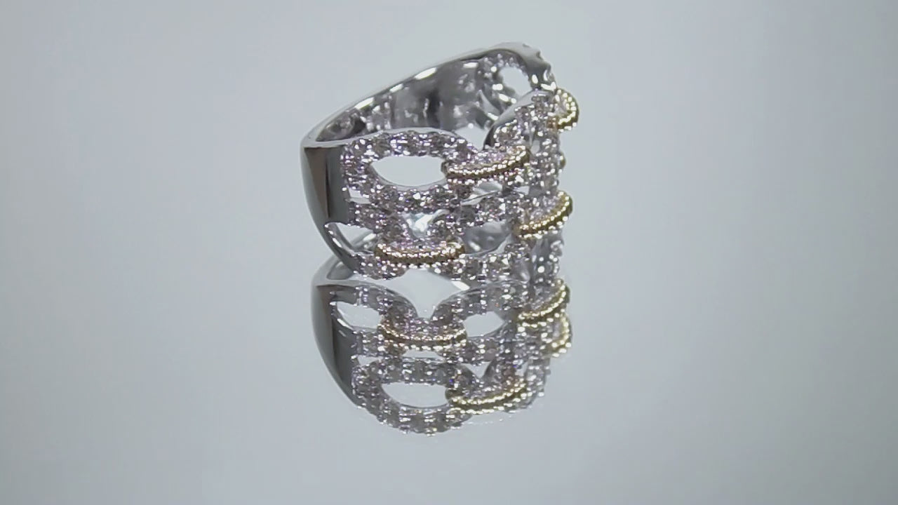 1.50ct double row two tone white and yellow gold natural diamond band rotating in a video on a white background.