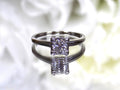 This is an estate .45ct round diamond solitaire ring in white gold with a white background.