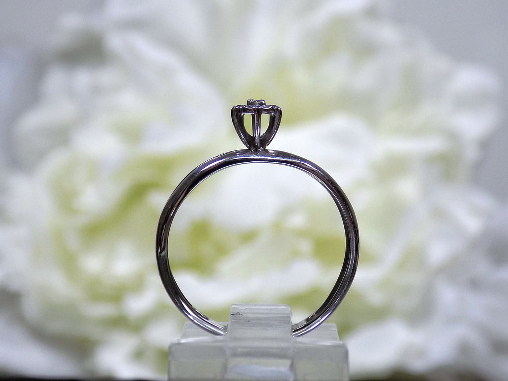 Women's Preowned white gold small diamond ring great for promise ring or inexpensive engagement ring.