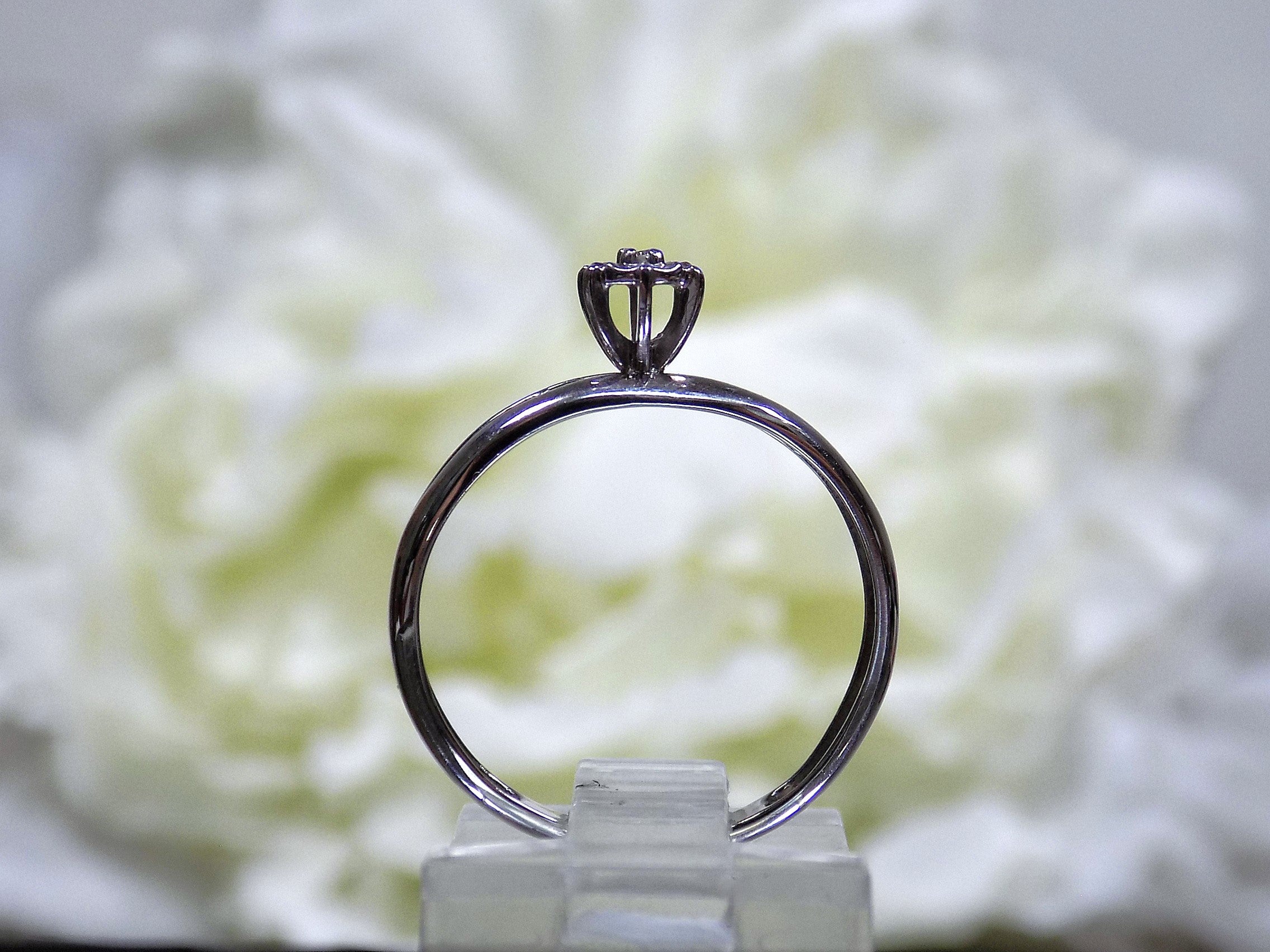 Women's Preowned white gold small diamond ring great for promise ring or inexpensive engagement ring.