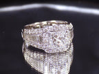 This is 3.68ct total weight natural diamond ring with a 2.05ct natural princess cut set in a legendary designer Simon G white gold mounting with a black background.