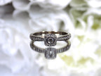 Preowned small natural diamond ring in the halo design great for promise ring or inexpensive engagement ring.