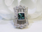 This is a women's 1.78ct total weight natural indicolite tourmaline and diamond Victorian style ring in white gold with a white background.