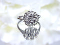 This is a 7 stone .10ct Total Weight Natural Diamond Vintage Ring in 14K White Gold.