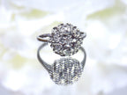 This is a 7 stone .10ct Total Weight Natural Diamond Vintage Ring in 14K White Gold.