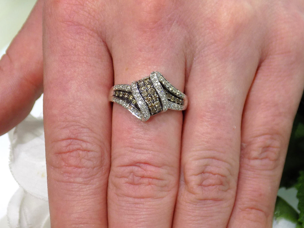 1.00ct white and chocolate diamond ring in white gold on a ladies finger.