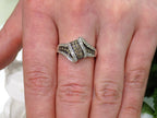 1.00ct white and chocolate diamond ring in white gold on a ladies finger.