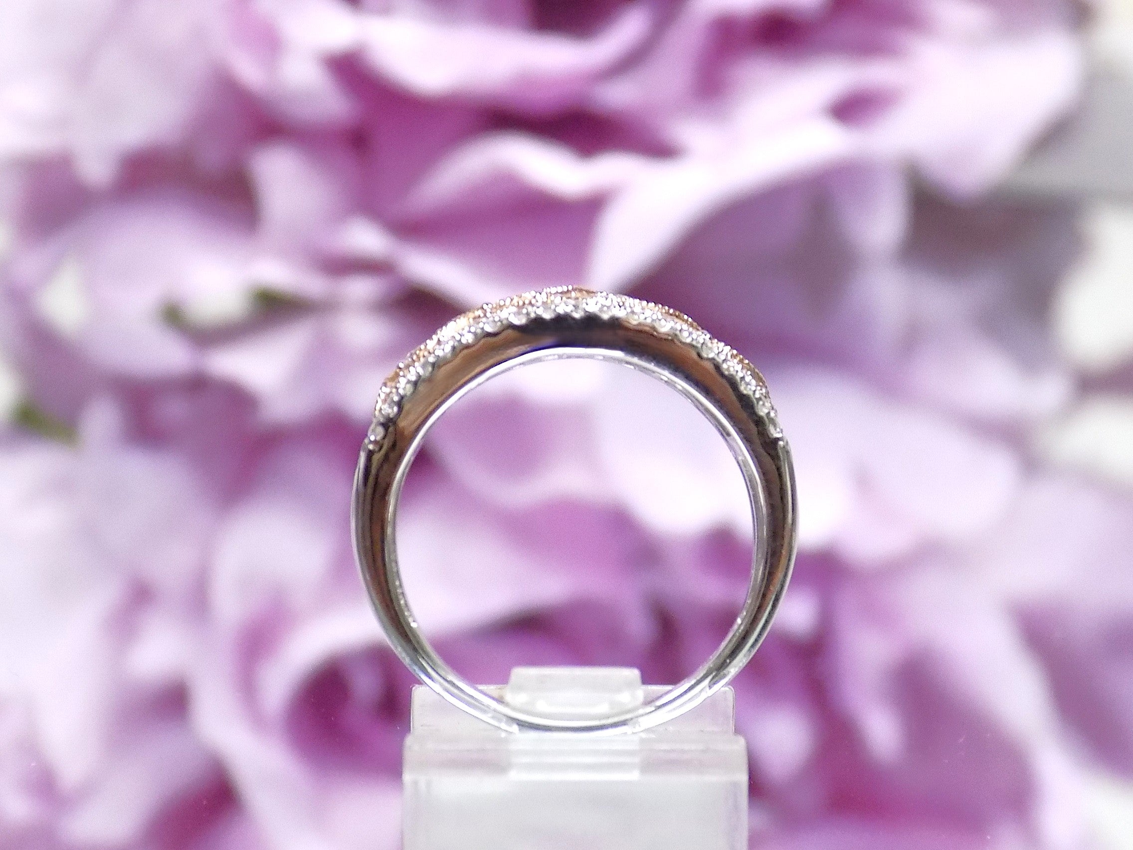 14K White and Rose Gold .75ct Diamond Band from a side view.