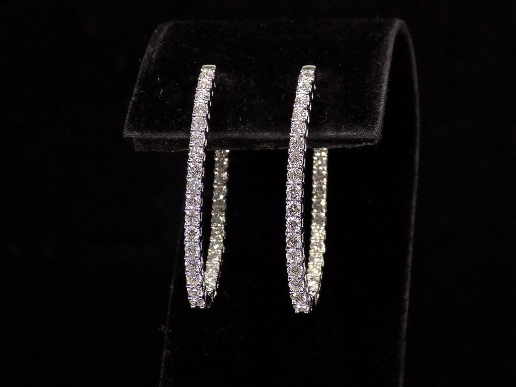2.00ct total weight natural diamond in and out style oval hoops in 14K white gold.