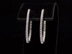 2.00ct total weight natural diamond in and out style oval hoops in 14K white gold.