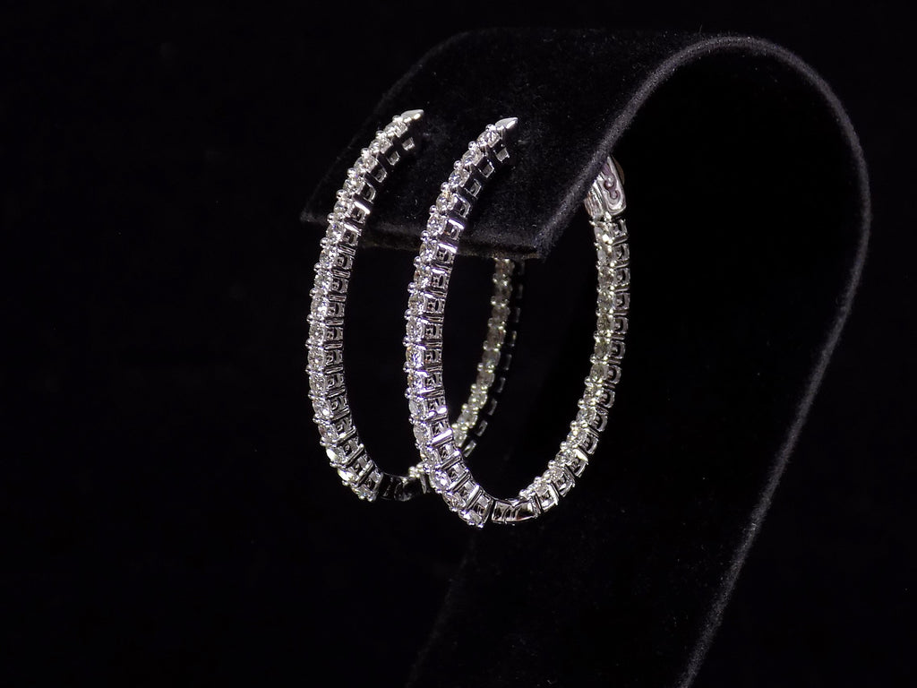 2.00ct total weight natural diamond in and out style oval hoops in 14K white gold. Side view.
