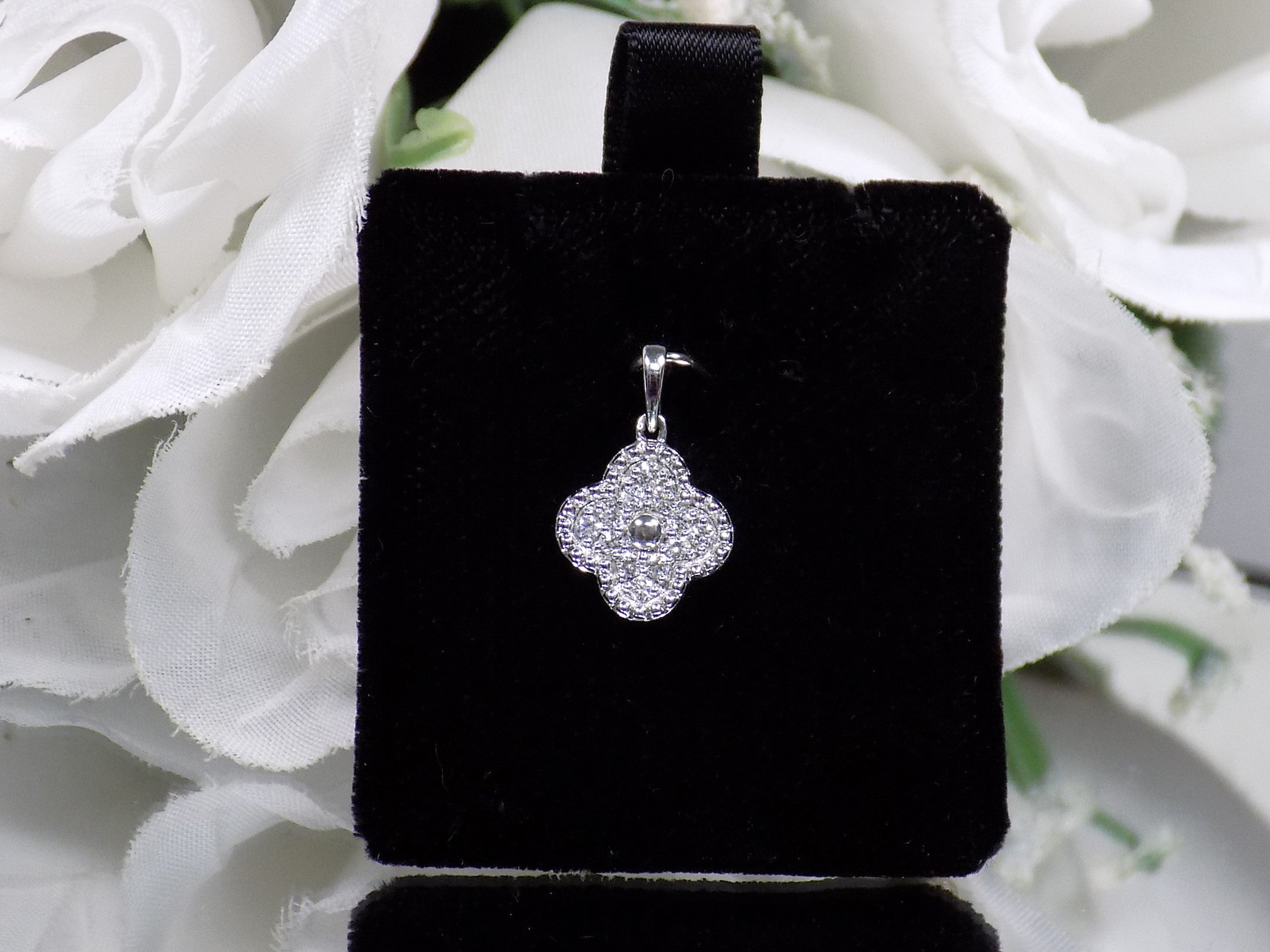 This is a .20ct Natural Diamond Van Cleef Style Clover Pendant White Gold