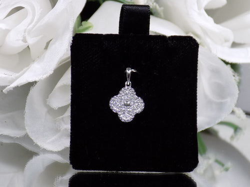 This is a .20ct Natural Diamond Van Cleef Style Clover Pendant White Gold